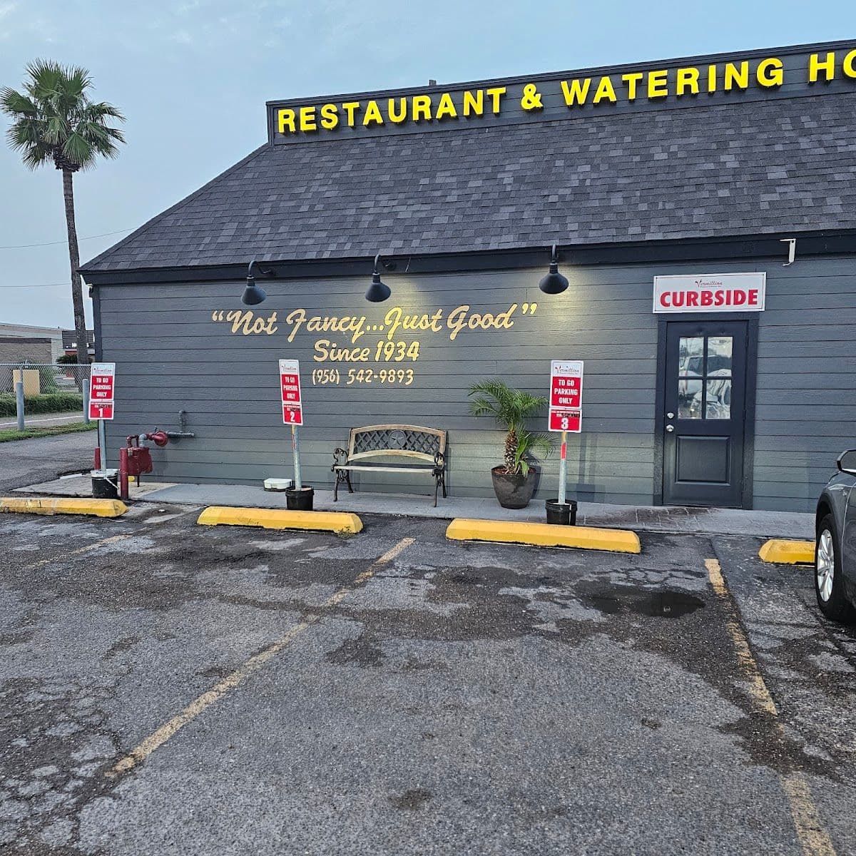 Vermillion Restaurant and Watering Hole logo